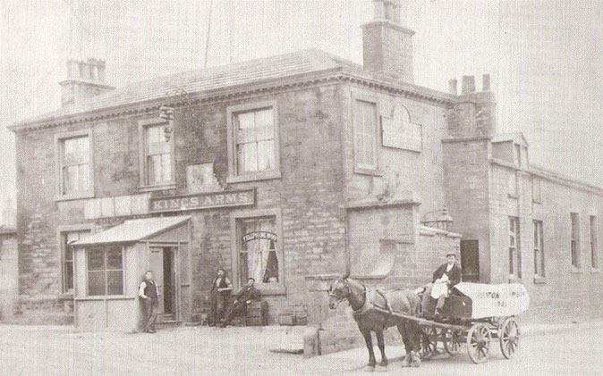 Black and white kings arms man horse and cart